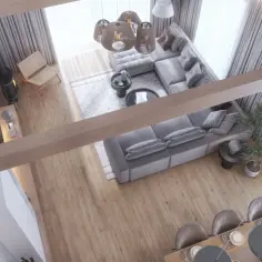 Widok z góry na nowoczesny salon z szarą sofą, drewnianą podłogą i kominkiem.